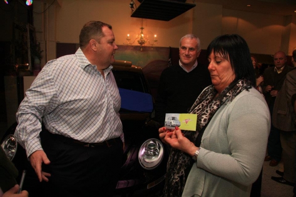 Felices ganadores del New Beetle